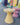 Bit stool cone I 100% resirkulert plast. Gul med hvite flekker. Brukes best som bord