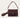 Adele Bag Real Suede Plum fra Noella er en skulderveske i 100 % semsket skinn med klafflukking, dekorativ metalldetalj og strukturert design i en dyp plommefarge.