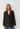 Modell med Boii Studios Solvej Multi Check oversized rutete blazer i ullblanding. Modellen er 174 cm høy og blazeren er one size.