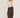 Modell med A-View Evalla Blouse Off White – figurnær offwhite blondetopp med rund hals, lange ermer og transparent blondemønster.