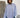 Modell med Boii Studios Fie Art Stripe oversized skjorte i 100 % bomull med fargerikt stripemønster.
