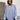 Modell med Boii Studios Fie Art Stripe oversized skjorte i 100 % bomull med fargerikt stripemønster.