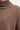 Detaljbilde av Merino Knit Rollneck fra A-View som viser den myke merinoullen, den ribbestrikkede høyhalsen og den fine strikkekvaliteten.
