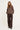 Merino Knit Rollneck fra A-View i brun merinoull, vist på modell forfra mot hvit bakgrunn.