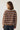 Modell bakfra med N-Merryll Knit Delissa Multi Stripe fra Noella – stripete strikkegenser med lange ermer og regular fit.