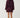 Modell sett bakfra i Noella N-Melda Dress Maroon med dekorativ knyting i ryggen, lange voluminøse ermer og kort skjørt.