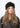 Modell med Jen Harka Hat Brown fra Sui Ava – brun hatt i semsket lammeskinn med myk, matt overflate.