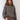 Modell forfra med BOII Adanne Polo Knit Brown/Blue Stripe – romslig bomullsgenser med brun bunn, lyseblå og offwhite striper, polokrage og knapper foran.