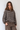 Modell forfra med BOII Adanne Polo Knit Brown/Blue Stripe – romslig bomullsgenser med brun bunn, lyseblå og offwhite striper, polokrage og knapper foran.