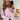 Modell med BOII Fie Shirt Lolly Stripe – fargerik stripete oversized skjorte i 100 % bomull med skjortekrage, knapper foran og brede ermer.