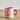 Millie Espresso Cup Multi fra Bloomingville – rosa espressokopp i steintøy med hvitt blomstermønster, stylet på trebord.