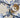 Eimy Plate Blue fra Creative Collection by Bloomingville – ulike håndmalte blå blomstermotiver stylet sammen på bord.