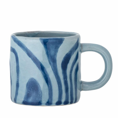 ChatGPT  Ninka Kruset fra Bloomingville har en tidløs form og størrelse som er ideell for dagens kaffe eller te.