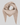 KEYLowee Scarf Beige fra MSCH Copenhagen stylet med spissen foran og lange ender – ribbestrikket skjerf i merinoull.