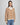 MSCH Copenhagen Amaria Zip Pullover i Egret/ C. Spice – strikkegenser i ull og resirkulert polyester med høy hals, halv glidelås og løs passform. Lengde ca. 60 cm.