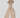 Modell med MSCH Copenhagen Bondie Hope Hood Scarf Beige – ribbestrikket beige hetteskjerf med hetten trukket over hodet og lange ender rundt halsen.