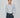 Juna slim-fit cardigan i ribbestrikk med perlemorsknapper – en lett og elegant hverdagsfavoritt.