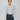 Juna slim-fit cardigan i ribbestrikk med perlemorsknapper – en lett og elegant hverdagsfavoritt.