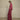 Shaelan Wide Pants Red fra MSCH Copenhagen – rød bukse med vide ben og lett glans, sett fra siden.