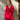 Modell i A-View Carrie Dress Red – rød, kort omslagskjole med glansfull satenglook, V-utringning, lange ermer og knytebelte i midjen. Kjolen har et asymmetrisk skjørt med dekorative volanger nederst og er stylet med sorte strømpebukser.